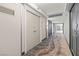 Hallway showcasing marble floors, modern lighting, and elevator access at 3111 Bel Air Dr # 20D, Las Vegas, NV 89109