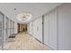 Well-lit hallway with stylish elevators, marble flooring, and views through large glass windows at 3111 Bel Air Dr # 20D, Las Vegas, NV 89109