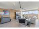 Comfortable living room featuring a large screen tv, stylish furniture, and expansive windows with city views at 3111 Bel Air Dr # 20D, Las Vegas, NV 89109