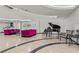 Elegant lobby with modern lighting, comfortable seating, grand piano, and stylish decor at 3111 Bel Air Dr # 20D, Las Vegas, NV 89109