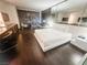 Modern bedroom suite boasts a king bed, seating area and city views at 4381 W Flamingo Rd # 2109, Las Vegas, NV 89103