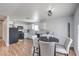 Bright kitchen features white cabinets, black appliances, and a cozy breakfast nook at 500 Duchess Ave, North Las Vegas, NV 89030