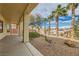 Backyard with desert landscaping and palm trees at 538 Cypress Gardens Pl, Henderson, NV 89012