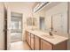 Bathroom with double sinks, tile floor, and a vanity at 538 Cypress Gardens Pl, Henderson, NV 89012
