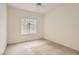 Well-lit bedroom with a window and neutral carpet at 538 Cypress Gardens Pl, Henderson, NV 89012
