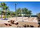 Community bocce ball courts with shaded seating and picnic tables at 538 Cypress Gardens Pl, Henderson, NV 89012