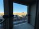 Balcony view overlooking the desert landscape with a wrought iron safety fence at 538 Ylang Pl, Henderson, NV 89015