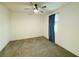 Bedroom featuring neutral walls, plush carpet, and ceiling fan at 538 Ylang Pl, Henderson, NV 89015