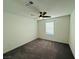Bedroom featuring carpet, white walls, a ceiling fan, and a window at 538 Ylang Pl, Henderson, NV 89015