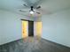 Bedroom with ceiling fan and natural light, adjacent to a barn door for closet access at 538 Ylang Pl, Henderson, NV 89015