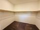 Walk-in closet with carpet and shelving at 538 Ylang Pl, Henderson, NV 89015