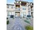 Inviting townhome showcasing desert landscaping and a private front balcony at 538 Ylang Pl, Henderson, NV 89015