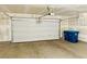 Open two car garage featuring an automatic door and ample space at 538 Ylang Pl, Henderson, NV 89015