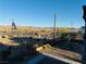 A clear desert community view from a balcony overlooking a walking path and desert landscaping at 538 Ylang Pl, Henderson, NV 89015