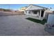 The backyard offers lots of space with covered patio and outdoor shed at 6165 Highland Gardens Dr, North Las Vegas, NV 89031
