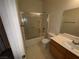 Standard bathroom featuring a shower-tub combo and a single sink vanity at 6165 Highland Gardens Dr, North Las Vegas, NV 89031