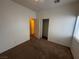 Bedroom featuring carpet flooring, standard closet, ceiling fan and neutral paint at 6165 Highland Gardens Dr, North Las Vegas, NV 89031
