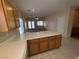 Spacious kitchen features light cabinetry, quartz countertops, and stainless appliances at 6165 Highland Gardens Dr, North Las Vegas, NV 89031