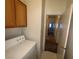 Laundry area featuring cabinets and standard white washer and dryer appliances at 6165 Highland Gardens Dr, North Las Vegas, NV 89031