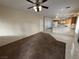 Spacious living room featuring new carpet and plenty of natural light, perfect for entertaining at 6165 Highland Gardens Dr, North Las Vegas, NV 89031