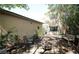 Backyard with a fire pit and comfortable seating arrangements at 6437 Boatbill St, North Las Vegas, NV 89084