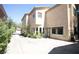 Exterior view of the house with a long driveway at 6437 Boatbill St, North Las Vegas, NV 89084