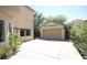 A detached two car garage and a driveway with ample parking space for multiple vehicles at 6437 Boatbill St, North Las Vegas, NV 89084