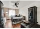 Bedroom with a ceiling fan, window, and a full-sized bed at 688 Quiet Stream Ct, Henderson, NV 89052