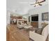 Open-concept living room, blending seamlessly with a modern kitchen and comfortable seating at 688 Quiet Stream Ct, Henderson, NV 89052