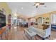 Open-concept living room with a kitchen and dining area at 688 Quiet Stream Ct, Henderson, NV 89052