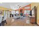 Comfortable living room with high ceilings, a fireplace, and tile flooring at 688 Quiet Stream Ct, Henderson, NV 89052