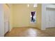 Inviting dining space with tile flooring, arched window, and natural light at 726 Sea Pines Ln, Las Vegas, NV 89107
