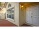 Up close exterior of the home's front entrance, window and stucco at 726 Sea Pines Ln, Las Vegas, NV 89107