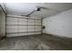 Spacious two car garage with ample room for parking and storage at 726 Sea Pines Ln, Las Vegas, NV 89107