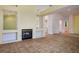 Spacious living room with fireplace and opening to kitchen and entry at 726 Sea Pines Ln, Las Vegas, NV 89107