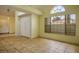 Open-concept living room with tile flooring and lots of light at 726 Sea Pines Ln, Las Vegas, NV 89107