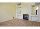 Living room featuring tile floors, fireplace, and window at 726 Sea Pines Ln, Las Vegas, NV 89107