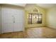 Living room entrance featuring tile flooring and front door view at 726 Sea Pines Ln, Las Vegas, NV 89107