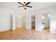 Spacious main bedroom featuring laminate floors, neutral walls, and access to the bathroom at 726 Sea Pines Ln, Las Vegas, NV 89107