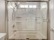 Shower and tub combination with sliding glass doors at 7530 Brisa Del Mar Ave, Las Vegas, NV 89179