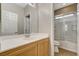 Bright bathroom with a combination shower and tub at 7530 Brisa Del Mar Ave, Las Vegas, NV 89179
