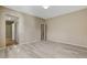 Bedroom with wood-look floors and an ensuite bathroom at 7530 Brisa Del Mar Ave, Las Vegas, NV 89179