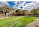 Well maintained green community space with artificial turf and landscaping at 7530 Brisa Del Mar Ave, Las Vegas, NV 89179