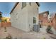 Exterior view of home showcasing rock landscaping, neutral paint and dual pane windows at 7530 Brisa Del Mar Ave, Las Vegas, NV 89179