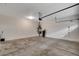 Large unfinished garage with concrete floor and white walls at 7530 Brisa Del Mar Ave, Las Vegas, NV 89179
