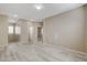 Bright living room featuring wood-look floors and neutral paint at 7530 Brisa Del Mar Ave, Las Vegas, NV 89179