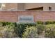 Community entrance sign amid lush shrubbery and brick wall at 7530 Brisa Del Mar Ave, Las Vegas, NV 89179