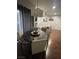Dining area featuring a round table with modern chairs, pendant lighting, and wood flooring at 8250 N Grand Canyon Dr # 1036, Las Vegas, NV 89166