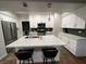 Modern kitchen featuring stainless steel appliances and a large quartz countertop island at 8250 N Grand Canyon Dr # 1036, Las Vegas, NV 89166