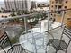 Enjoy relaxing on the balcony with comfortable seating and views of greenery and amenities at 8255 Las Vegas Blvd # 711, Las Vegas, NV 89123